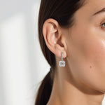 Model is wearing an Asscher Solitaire Drop Earrings of 3 carat Diamond