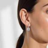 Model is wearing an Asscher Solitaire Drop Earrings of 3 carat Diamond