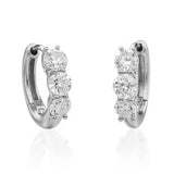 The Side Look of Cushion Lab Grown Diamond Huggie Hoop Earrings feature three brilliant lab-grown diamonds in each earring, available in 1, 2, and 3 carat weight options in 14K or 18K gold | Adorn By You