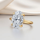 Stunning oval solitaire ring with a hidden halo, set in a sleek yellow gold  or white gold or rose gold or platinum band for timeless elegance available in 2-5 carat options | Adorn By You