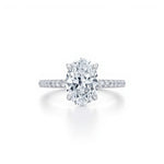 Oval Solitaire Engagement Ring with side Halo and  Pavé Band  | Adorn By You