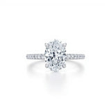 Oval Solitaire Engagement Ring with side Halo and  Pavé Band  | Adorn By You