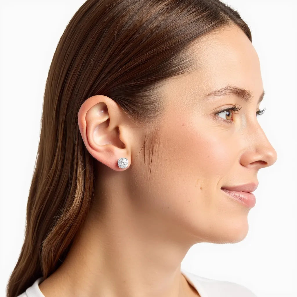 A model wearing our Elegant Round Lab-Grown Diamond Studs in 14K/18K gold, 0.25–6 carats, with secure screw-backs.