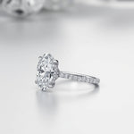 The Celestial Grace - Oval Solitaire with side Halo and  Pavé Band. This is the classic ring for a perfect engagement or proposal occasion.  | Adorn By You