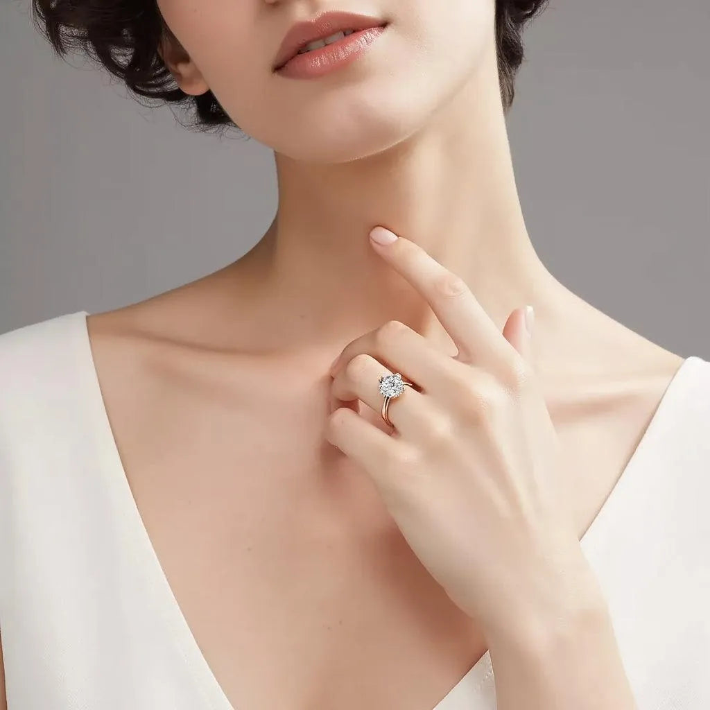 Model wearing Classic Six-Prong Solitaire Engagement Ring in Platinum or White Gold