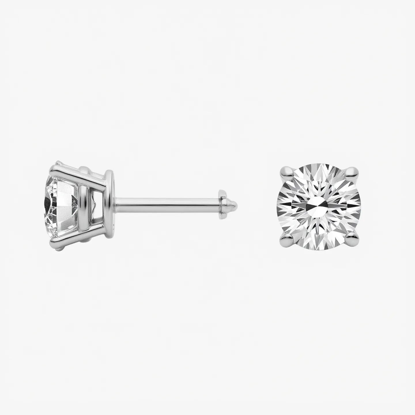 Side view of round lab-grown diamond solitaire studs earrings | Adorn By You