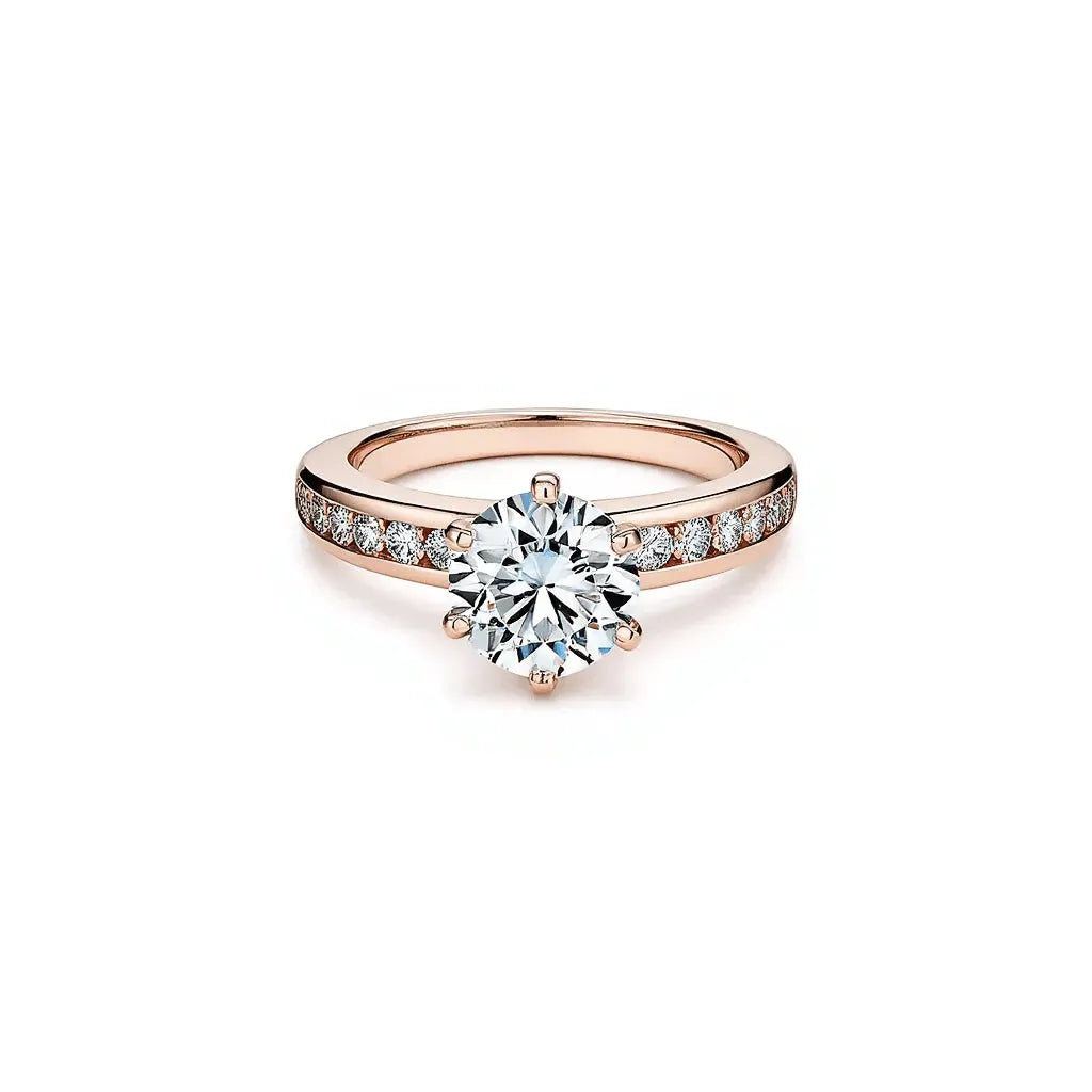 top view of engagement ring with a channel set diamond band in rose gold